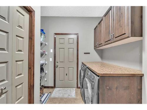 22 Cranarch Link Se, Calgary, AB - Indoor Photo Showing Laundry Room