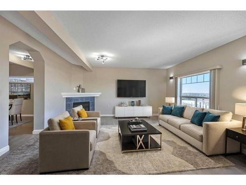 264 Panamount Hill, Calgary, AB - Indoor Photo Showing Living Room With Fireplace