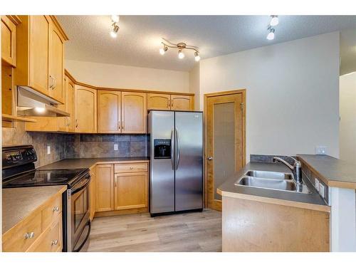 49 Everglen Crescent Sw, Calgary, AB - Indoor Photo Showing Kitchen With Double Sink