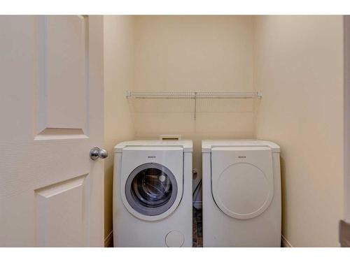 49 Everglen Crescent Sw, Calgary, AB - Indoor Photo Showing Laundry Room