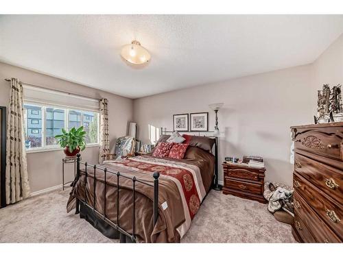 1120 Kingston Crescent, Airdrie, AB - Indoor Photo Showing Bedroom