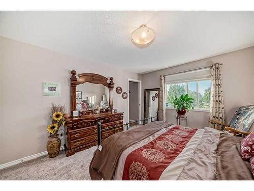 1120 Kingston Crescent, Airdrie, AB - Indoor Photo Showing Bedroom