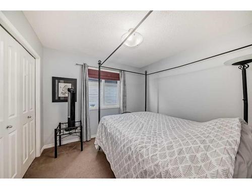 1120 Kingston Crescent, Airdrie, AB - Indoor Photo Showing Bedroom