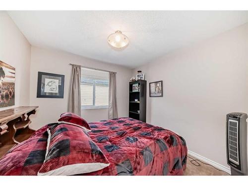 1120 Kingston Crescent, Airdrie, AB - Indoor Photo Showing Bedroom