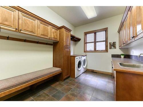 54 Rockcliff Landing Nw, Calgary, AB - Indoor Photo Showing Laundry Room