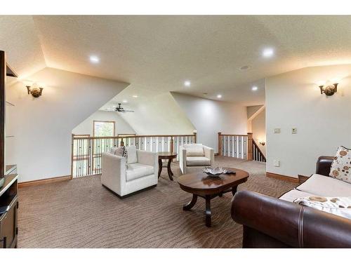 54 Rockcliff Landing Nw, Calgary, AB - Indoor Photo Showing Living Room