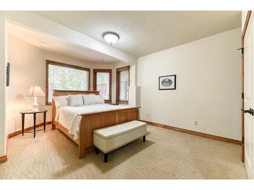 54 Rockcliff Landing Nw, Calgary, AB - Indoor Photo Showing Bedroom