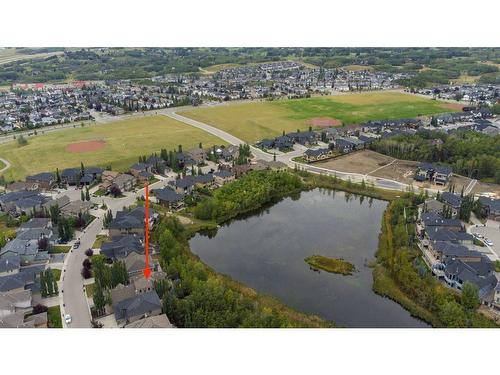 54 Rockcliff Landing Nw, Calgary, AB - Outdoor With Body Of Water With View