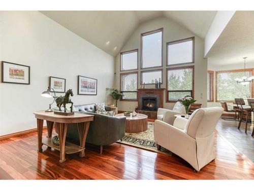 54 Rockcliff Landing Nw, Calgary, AB - Indoor Photo Showing Living Room With Fireplace