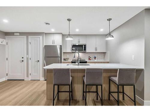 339 Hendon Drive Nw, Calgary, AB - Indoor Photo Showing Kitchen With Upgraded Kitchen