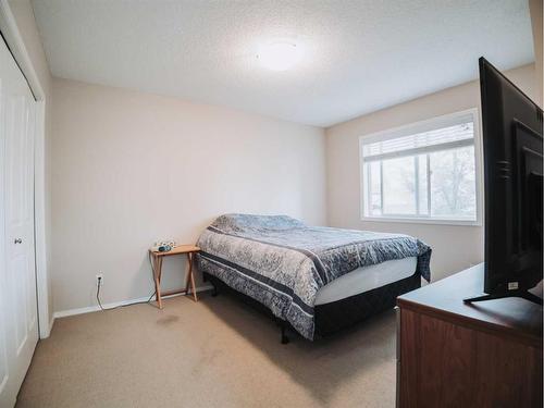 207 Cranberry Way Se, Calgary, AB - Indoor Photo Showing Bedroom