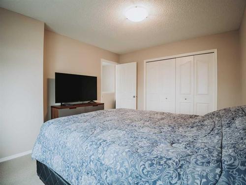 207 Cranberry Way Se, Calgary, AB - Indoor Photo Showing Bedroom