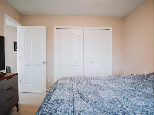 207 Cranberry Way Se, Calgary, AB - Indoor Photo Showing Bedroom