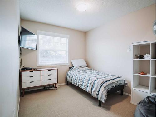 207 Cranberry Way Se, Calgary, AB - Indoor Photo Showing Bedroom