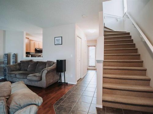 207 Cranberry Way Se, Calgary, AB - Indoor Photo Showing Living Room