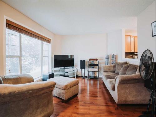 207 Cranberry Way Se, Calgary, AB - Indoor Photo Showing Living Room