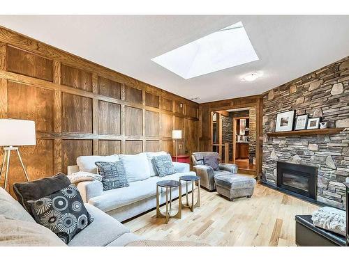 27 Deermont Place Se, Calgary, AB - Indoor Photo Showing Living Room With Fireplace