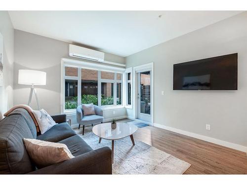 108-1720 10 Street Sw, Calgary, AB - Indoor Photo Showing Living Room