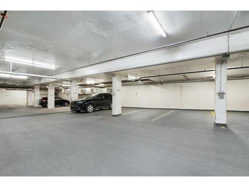 108-1720 10 Street Sw, Calgary, AB - Indoor Photo Showing Garage