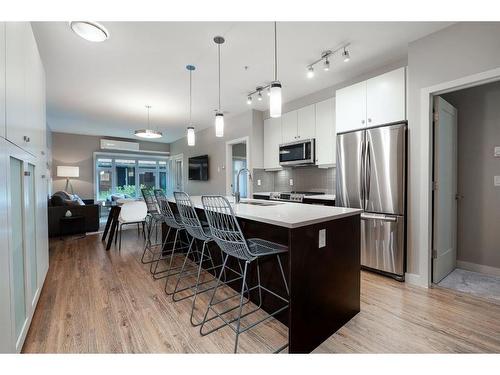 108-1720 10 Street Sw, Calgary, AB - Indoor Photo Showing Kitchen With Stainless Steel Kitchen With Upgraded Kitchen