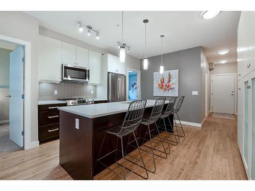 108-1720 10 Street Sw, Calgary, AB - Indoor Photo Showing Kitchen With Stainless Steel Kitchen With Upgraded Kitchen