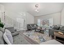 176 Templeby Drive Ne, Calgary, AB  - Indoor Photo Showing Living Room 