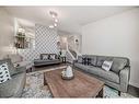 176 Templeby Drive Ne, Calgary, AB  - Indoor Photo Showing Living Room 