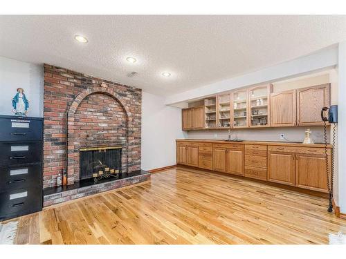 5960 Dalridge Hill Nw, Calgary, AB - Indoor Photo Showing Other Room With Fireplace