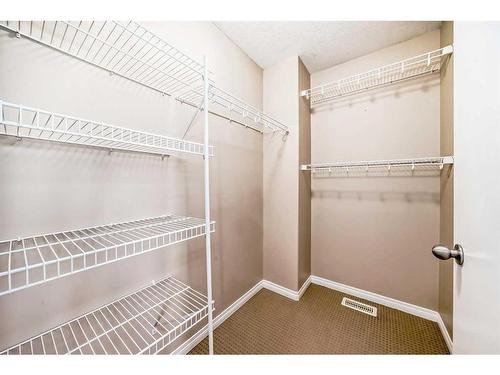 1005 New Brighton Gardens Se, Calgary, AB - Indoor With Storage