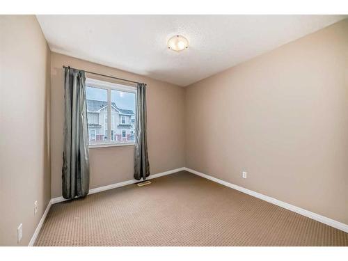 1005 New Brighton Gardens Se, Calgary, AB - Indoor Photo Showing Other Room