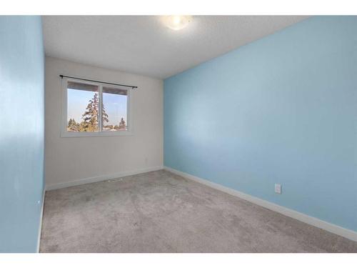 808-919 38 Street Ne, Calgary, AB - Indoor Photo Showing Other Room