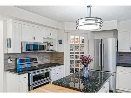 24 Christie Park Hill Sw, Calgary, AB - Indoor Photo Showing Kitchen With Stainless Steel Kitchen With Upgraded Kitchen