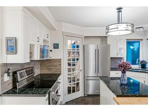 24 Christie Park Hill Sw, Calgary, AB - Indoor Photo Showing Kitchen With Stainless Steel Kitchen With Upgraded Kitchen