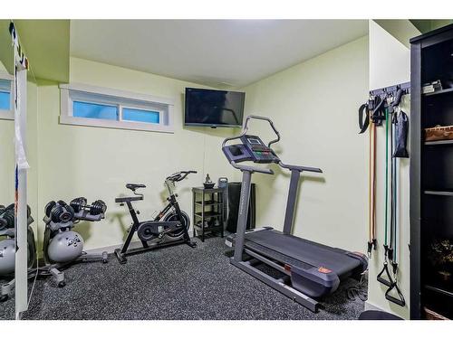 24 Christie Park Hill Sw, Calgary, AB - Indoor Photo Showing Gym Room