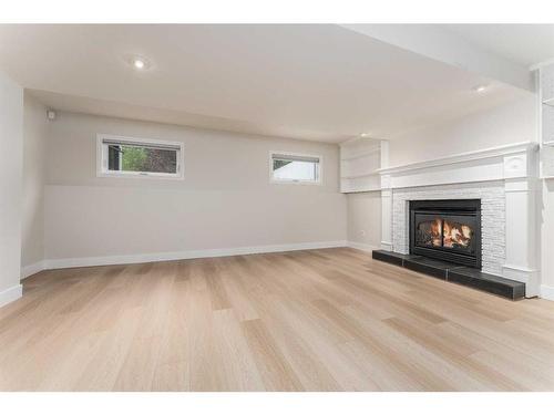 231 Grizzly Crescent, Canmore, AB - Indoor Photo Showing Living Room With Fireplace