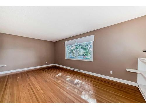 60 Springwood Drive Sw, Calgary, AB - Indoor Photo Showing Other Room