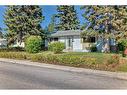 60 Springwood Drive Sw, Calgary, AB  - Outdoor With Facade 