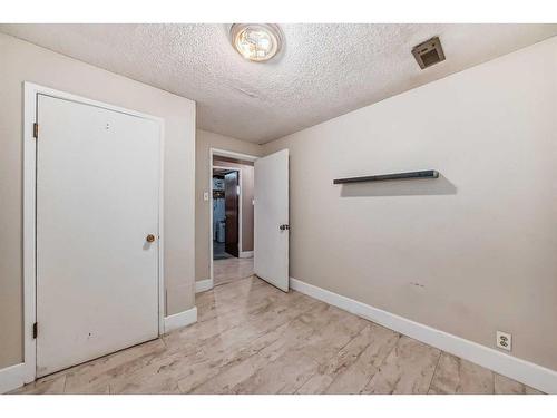 60 Springwood Drive Sw, Calgary, AB - Indoor Photo Showing Other Room