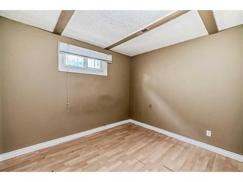 60 Springwood Drive Sw, Calgary, AB - Indoor Photo Showing Other Room