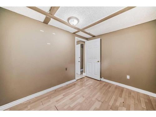 60 Springwood Drive Sw, Calgary, AB - Indoor Photo Showing Other Room