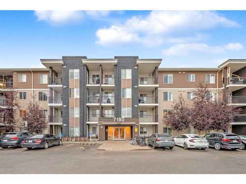 321-7180 80 Avenue Ne, Calgary, AB - Outdoor With Balcony With Facade