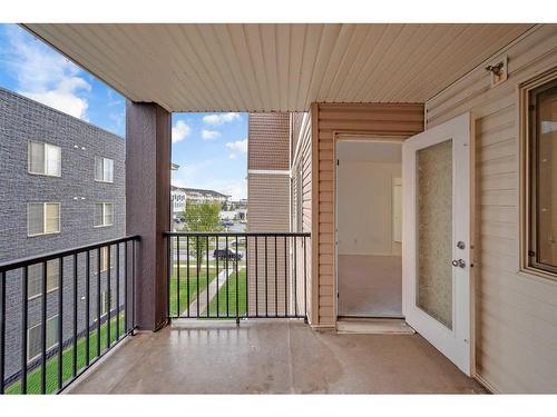 321-7180 80 Avenue Ne, Calgary, AB - Outdoor With Balcony With Exterior