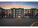 321-7180 80 Avenue Ne, Calgary, AB  - Outdoor With Balcony With Facade 