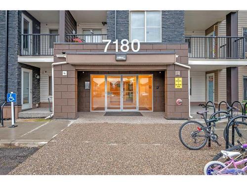 321-7180 80 Avenue Ne, Calgary, AB - Outdoor With Balcony