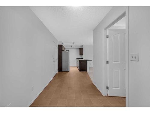 321-7180 80 Avenue Ne, Calgary, AB - Indoor Photo Showing Other Room