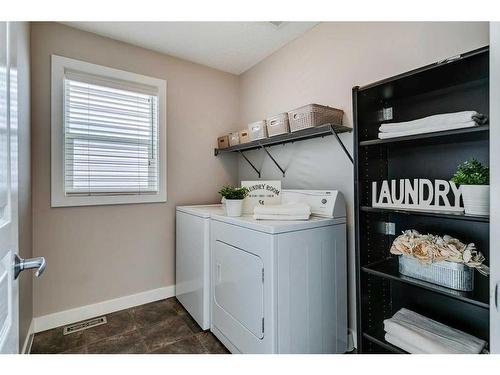 52 Auburn Bay Crescent Se, Calgary, AB - Indoor Photo Showing Laundry Room