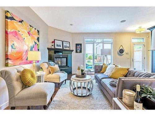 2428 7 Avenue Nw, Calgary, AB - Indoor Photo Showing Living Room With Fireplace