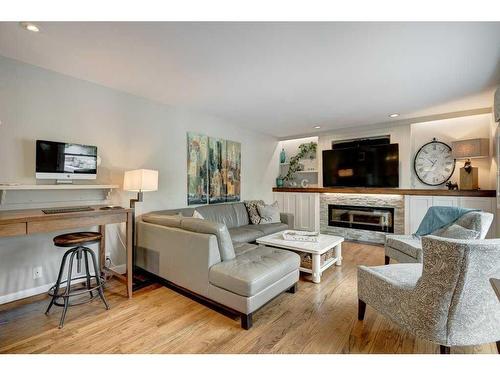 143 Parkview Green Se, Calgary, AB - Indoor Photo Showing Living Room With Fireplace