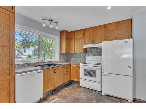 2212 29 Avenue Sw, Calgary, AB - Indoor Photo Showing Kitchen With Double Sink