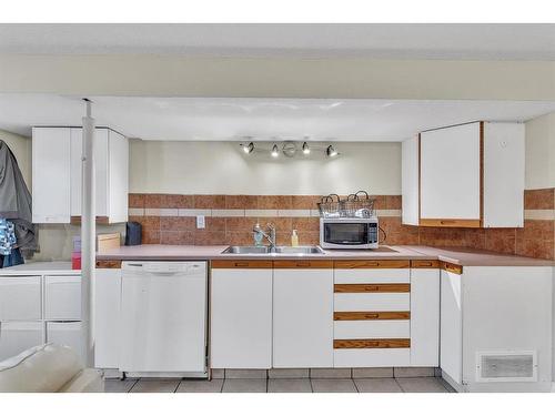 2212 29 Avenue Sw, Calgary, AB - Indoor Photo Showing Kitchen With Double Sink